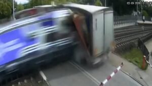Driver of lorry hit by Polish train refused to break through barriers Driver of lorry hit by Polish train refused to break through barriers