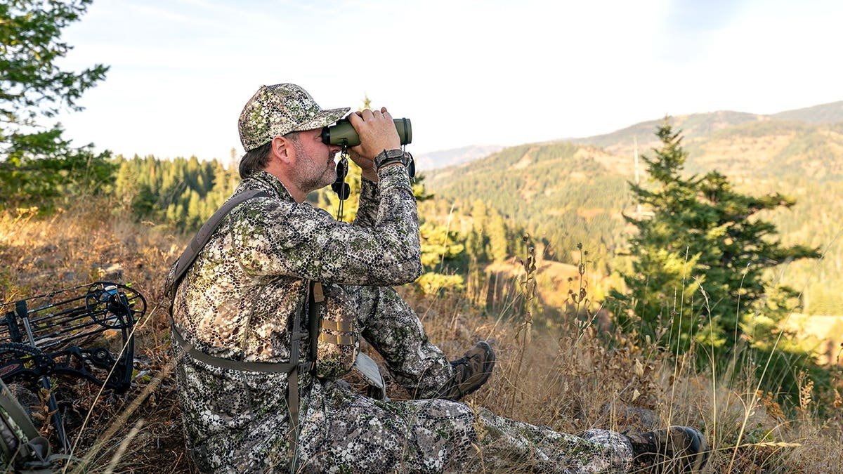Stock image of hunter in wilderness