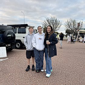 Dani Hansen, right, with her children Isabella and Jarvis shopping at the markets.