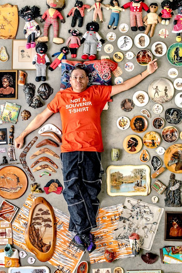 Tony Albert with examples of kitsch Aboriginalia sent in by the public As part of Tony Albert’s solo show Not a Souvenir At th MCA he called for the public to send in examples of Aboriginalia. Some of it is funny, others are horrific.