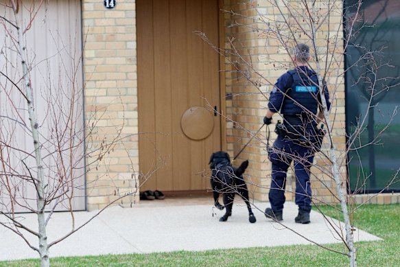 Police have raided the home of former CFMEU boss John Perkovic.