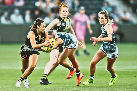 Monique Conti, at left, in 2021 is known for her explosive speed. 