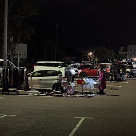 Shoppers arrive to the Melville Markets by 4.30am to look for a bargain while traders set up their stalls.