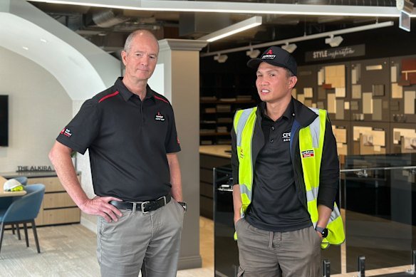 Summit Homes Group general manager Cameron Lade and roof plumber Anthony Sibayan.