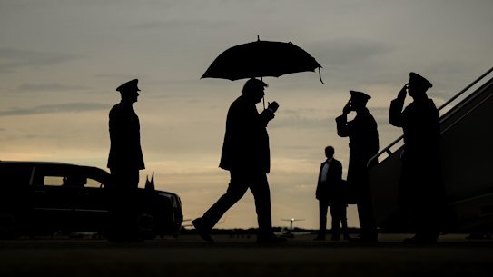 US President Donald Trump, pictured boarding Air Force One on Friday, downplayed the conflict with Iran as “small potatoes”.