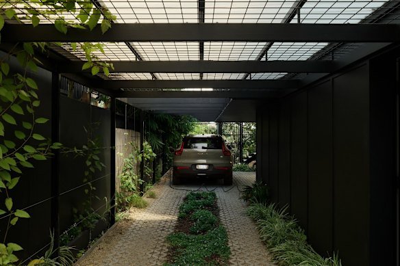 The carport nods to undercroft spaces familiar in older Queensland homes. 