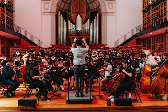 Rehearsing Vivaldi inside Verbrugghen Hall on the school’s campus.