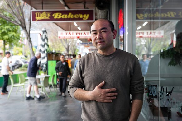 Cuong Nguyen in front of his restaurant, Pho Hien Saigon.