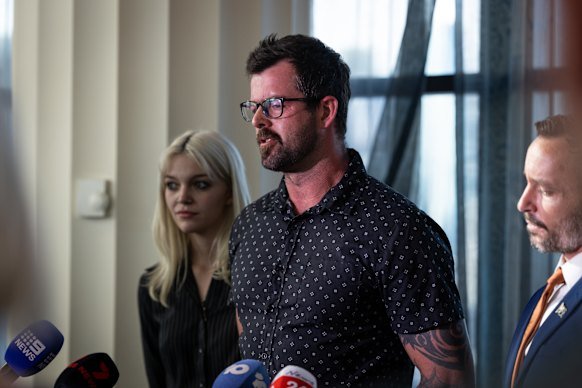 Warren Pickering (right) with stepson Johnny and daughter Jhett at the press conference this week.