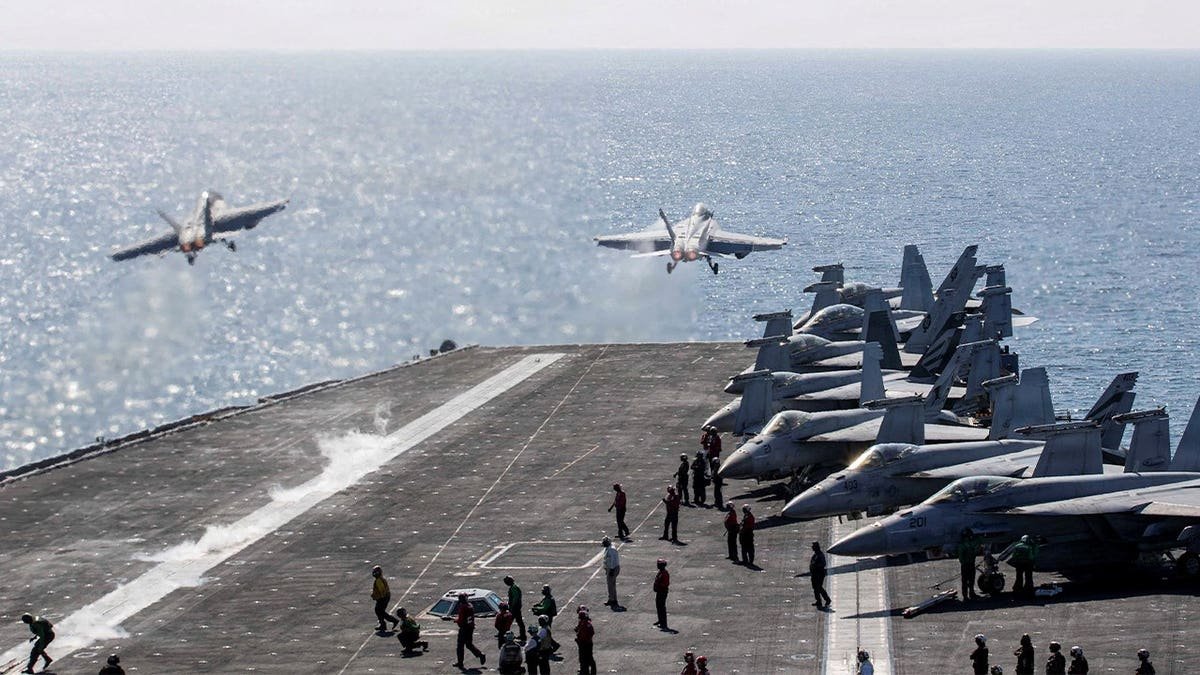 Two F/A-18 Super Hornets take off