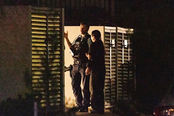 Police establish a crime scene where the child was shot on Monday.