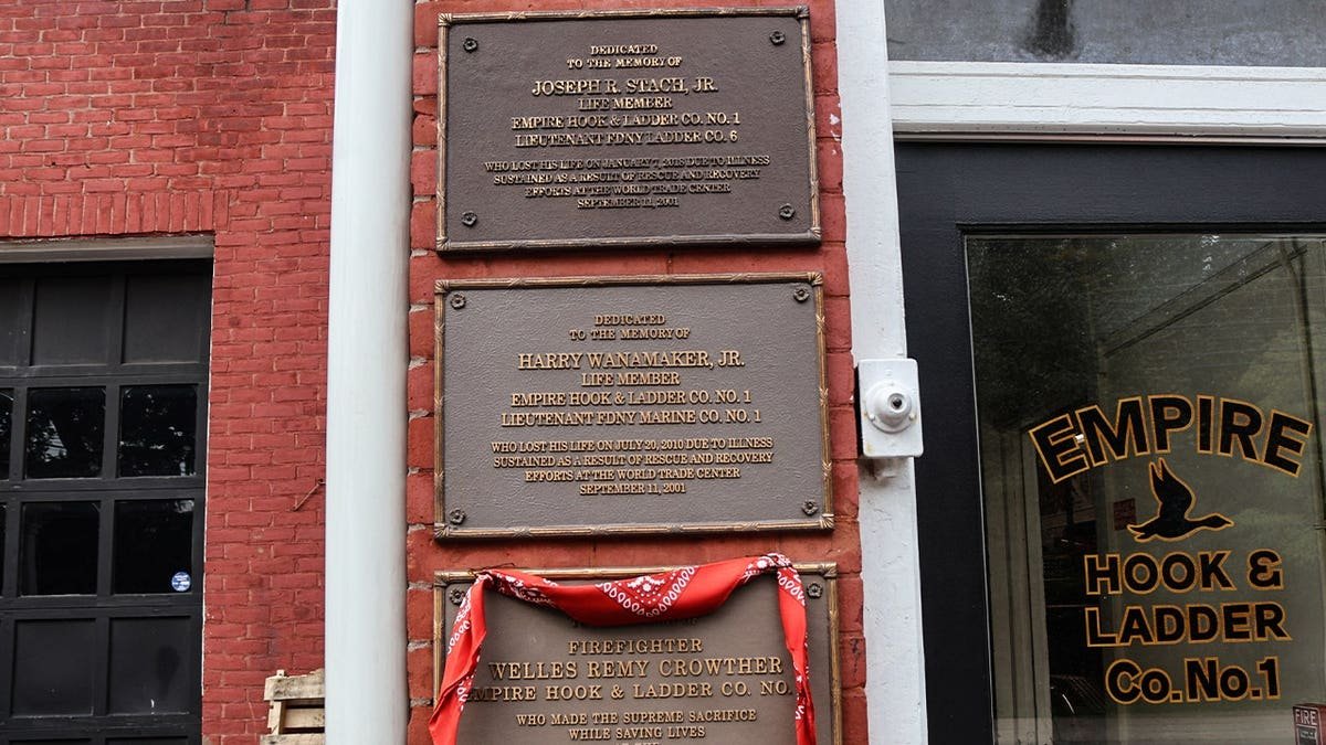 Plaques hanging outside of Empire Hook and Ladder Company No.1 commemorating the firemen they lost in relation to the terrorist attacks of Sept. 11, 2001.