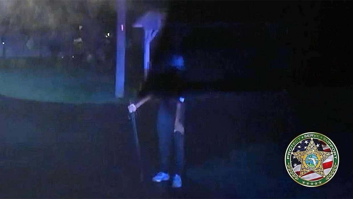Sword-wielding suspect seen in police bodycam video