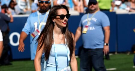 Bill Belichick’s Girlfriend Jordon Hudson Trades Snakeskin for a Jumpsuit While Cheering on UNC 