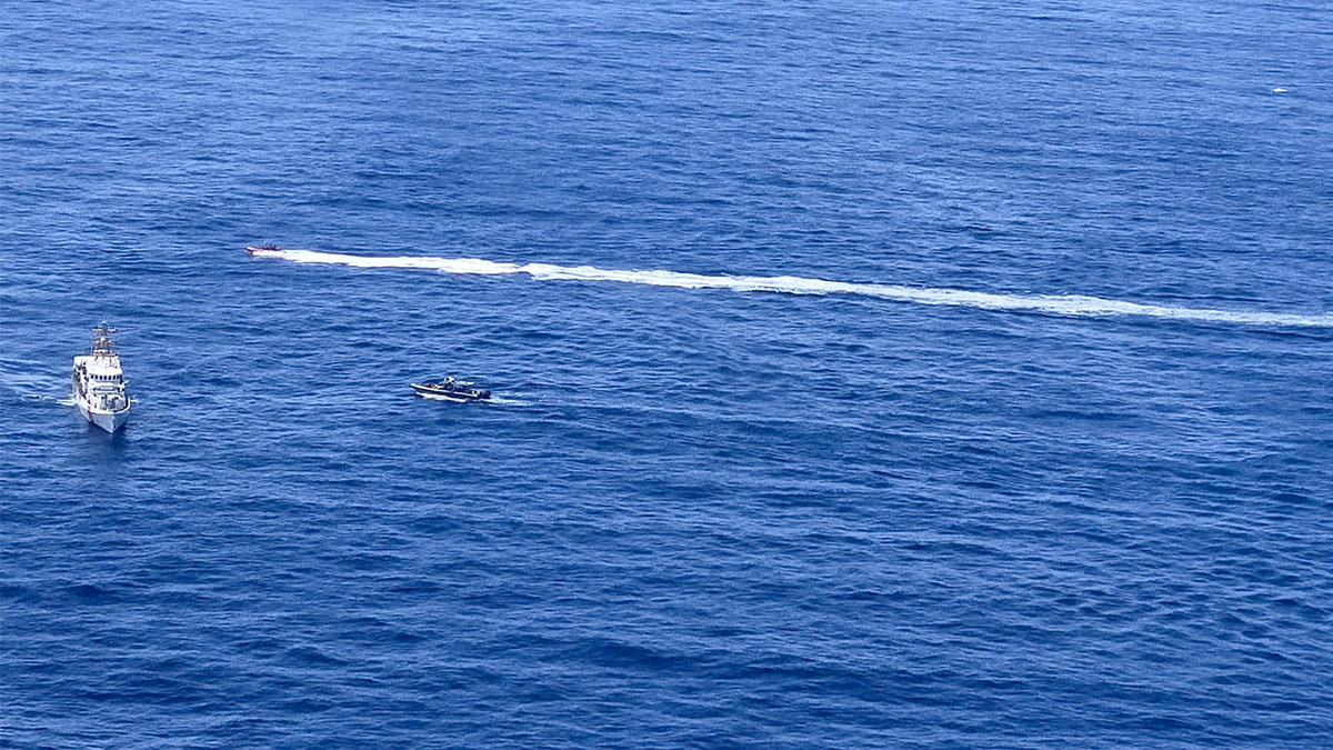 Coast Guard responding to the capsized vessel off Mona Island