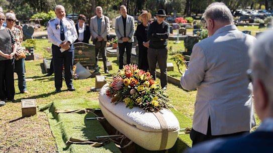 The interment of Carolyn in a coffin grown of mushrooms at Springwood Cemetery on Friday.