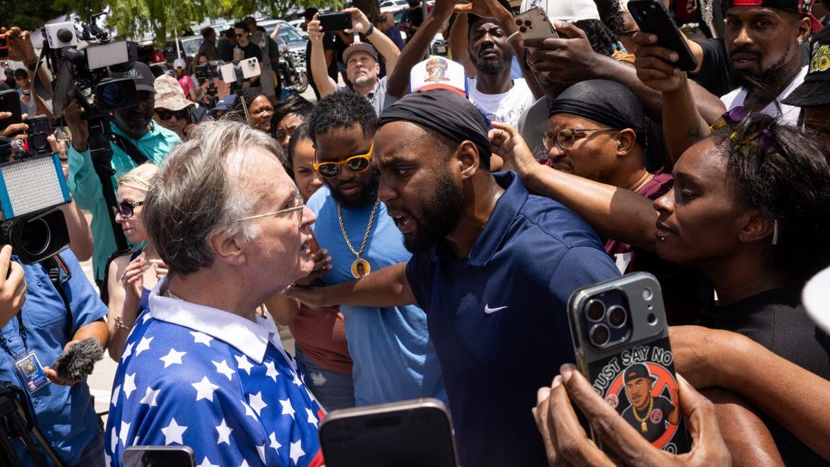 Supporters of Austin Metcalf and Karmelo Anthony clashing outside Collin County Courthouse in McKinney Texas