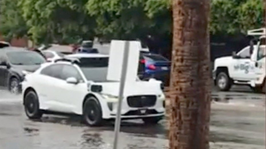 A Waymo driverless car on the street. 