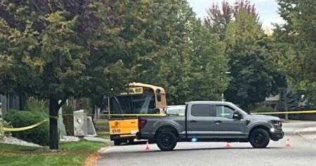 RCMP remind drivers to stop for school buses after two Kelowna students are struck by a vehicle