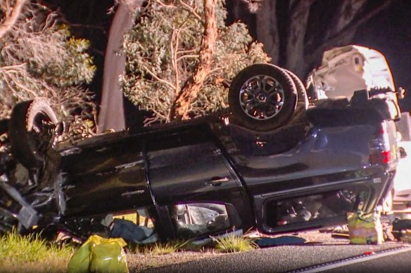 Another damaged vehicle, with a yellow L plate seen on the back. 