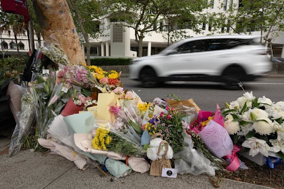 Mourners laid flowers in tribute to Lay.