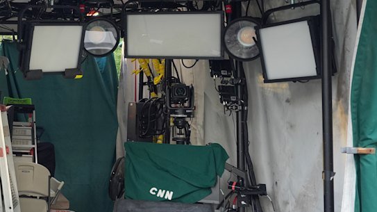 The covered television positions for CNN on the North Lawn of the White House.