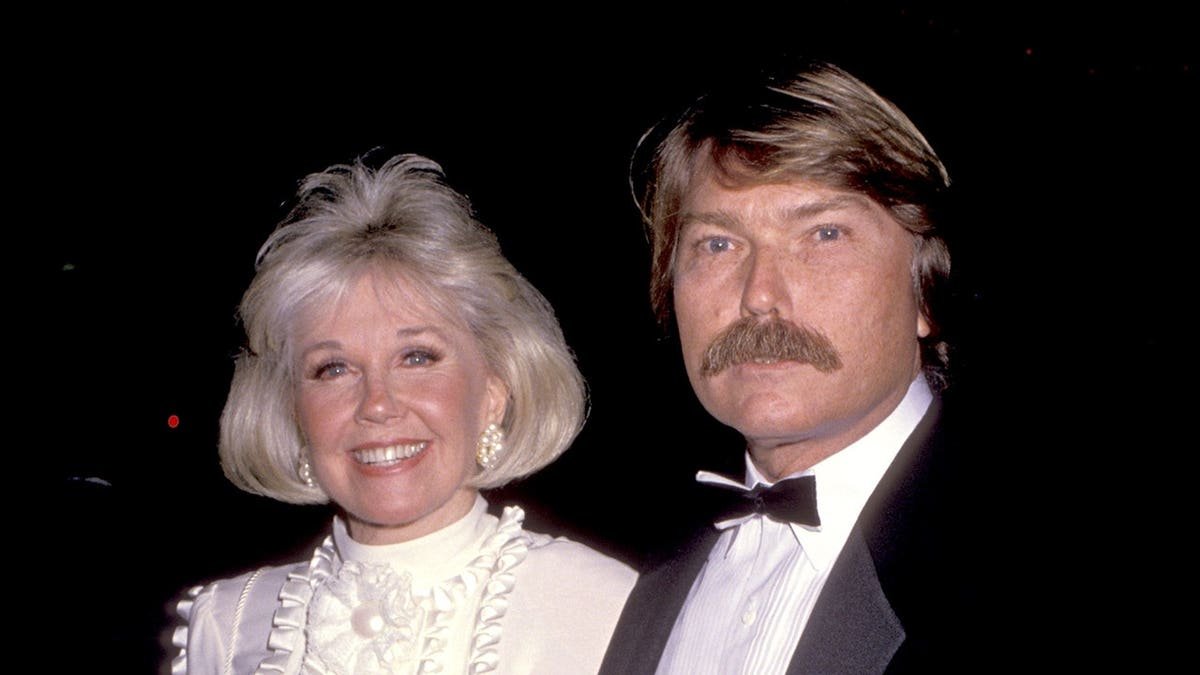 Doris Day and Terry Melcher pose together.