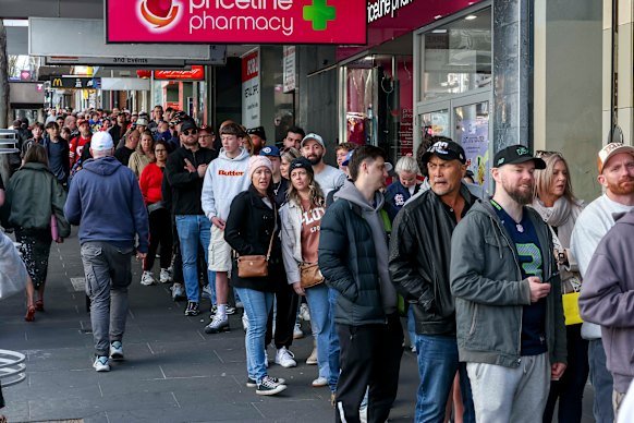 NFL fans queuing up for official merchandise on Bourke Street on September 10.
