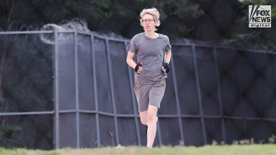 Theranos CEO Elizabeth Holmes exercises in federal jail.