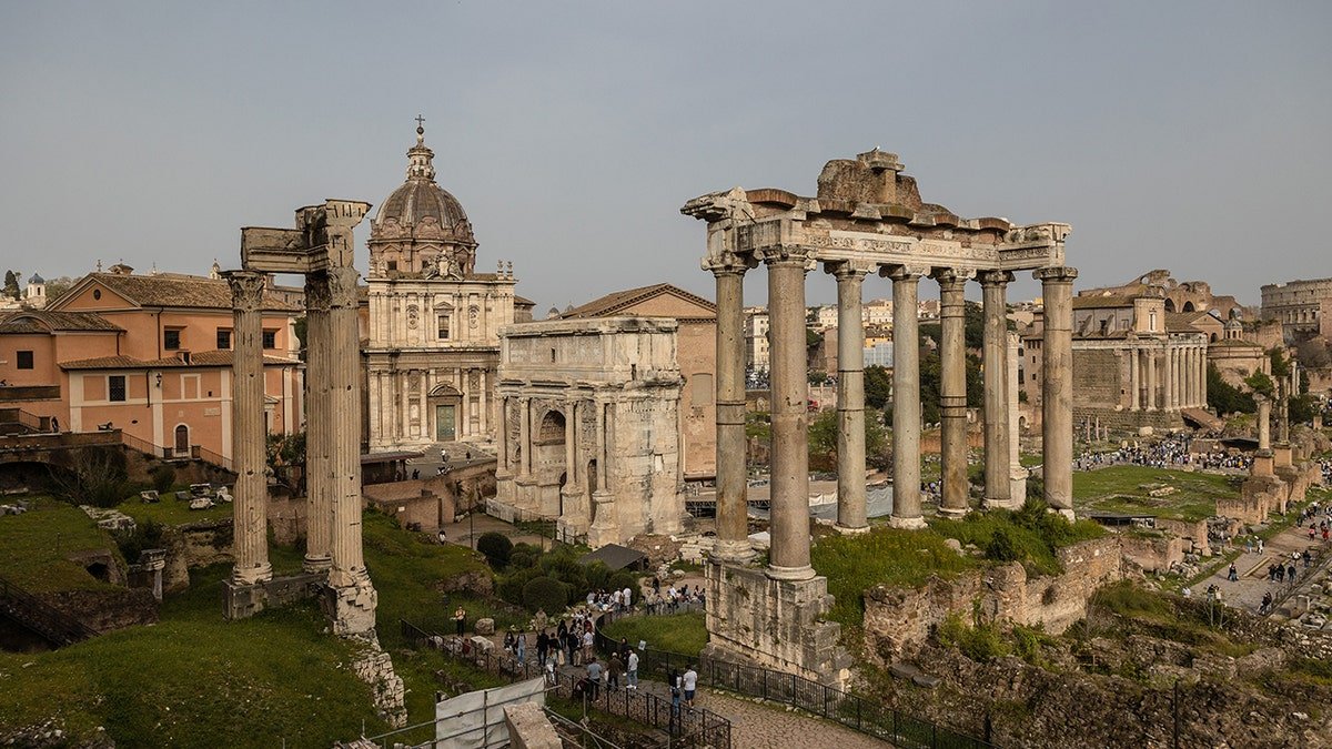 View of ruined temple near the Colosseum in Rome