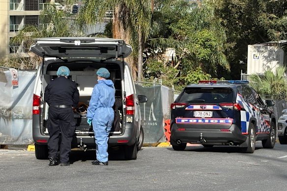 Police at Lambert Street in Kangaroo Point on Friday.
