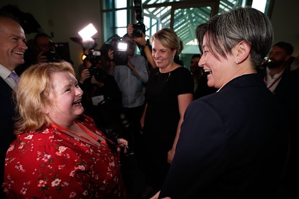 Bill Shorten and Tanya Plibersek watch as Magda Szubanski embraces Senator Penny Wong after the vote on the Marriage Amendment Bill at Parliament House in Canberra on December 7, 2017.
