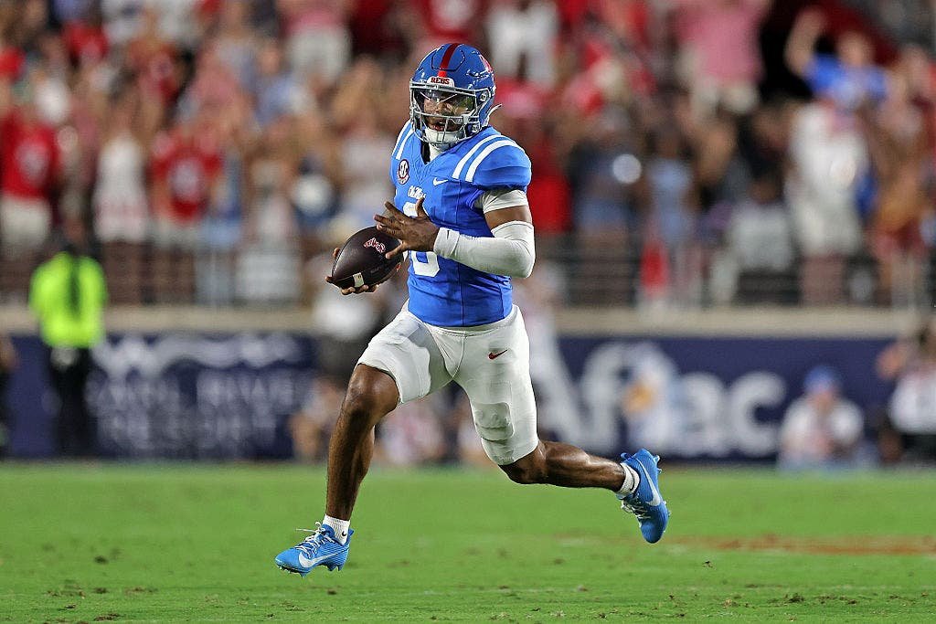 Trinidad Chambliss has rushed for nearly 600 yards and 10 touchdowns in his 16 starts. But he's much more interested in beating opponents with his arm than his legs. (Photo by Justin Ford/Getty Images)