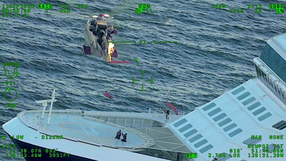 Helicopter rescue operation near Celebrity Solstice cruise ship.