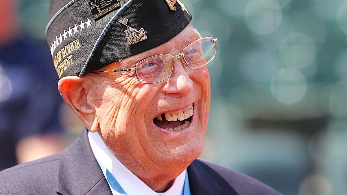 Hershel Williams, 97, stands at Slugger Field during Military Appreciation Day.