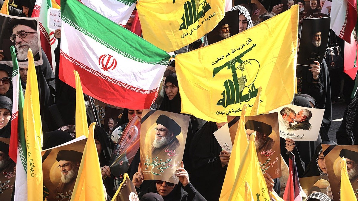 Hezbollah and Iranian flags