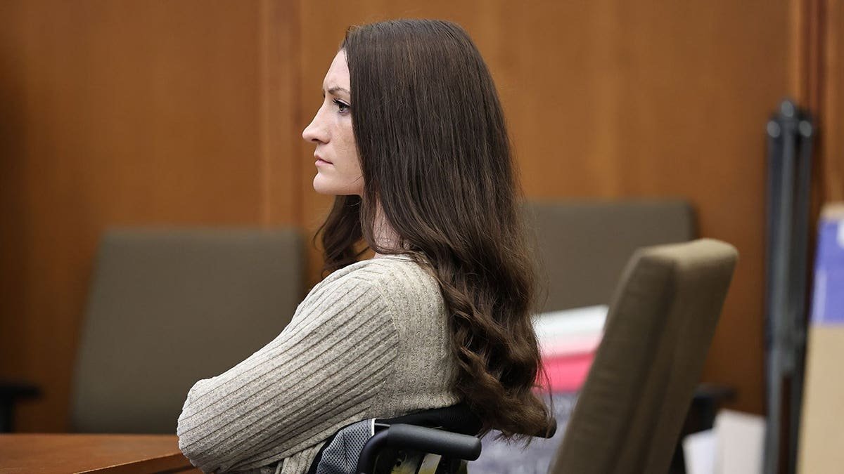 Lindsay Clancy listens to testimony in Plymouth Superior Court.