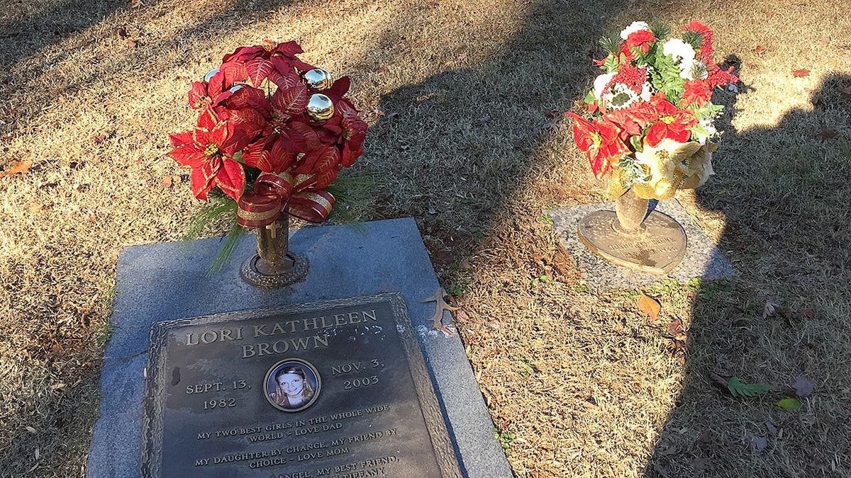 A grave site with flowers