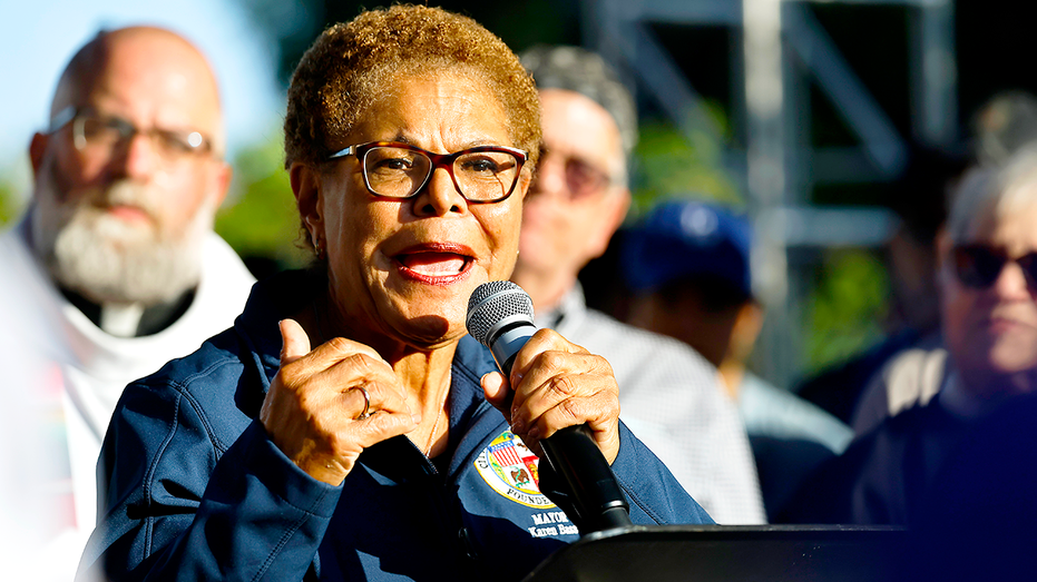 Los Angeles Mayor Karen Bass speaking into a microphone.