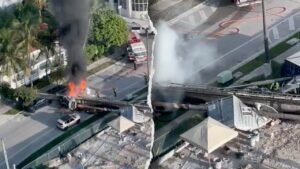 Construction rig collapses on 3 cars in Miami, traps workers as fire erupts