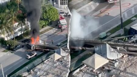 Construction rig collapses on 3 cars in Miami, traps workers as fire erupts