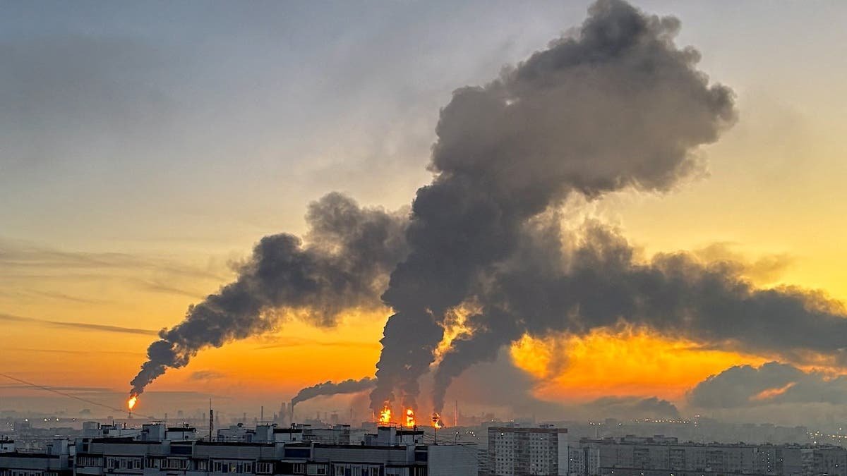 Smoke plumes rise from fires at an oil refinery in Moscow following a drone strike.
