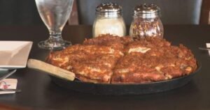 Bombers, Riders fans clash over ‘Regina-style’ pizza in Labour Day Classic trash talk