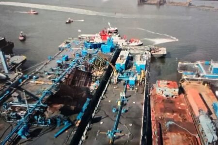 One dead after explosion at Staten Island barge triggers massive fire