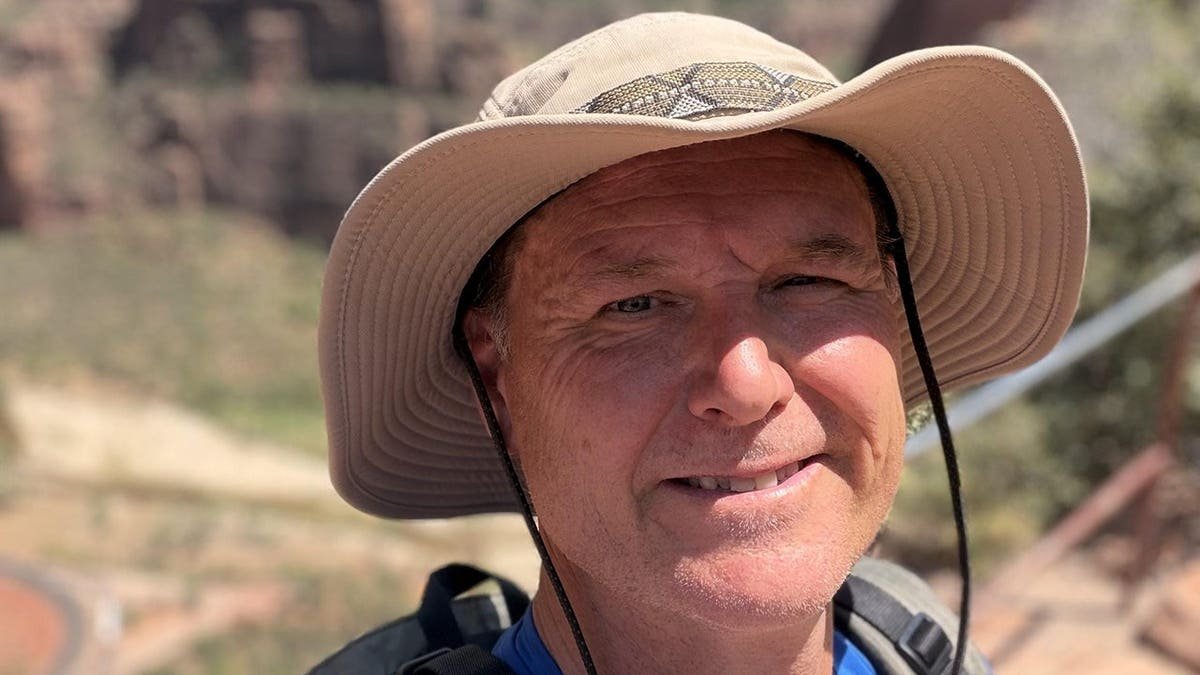 Timothy Smith poses during a family trip at Zion National Park in Utah.