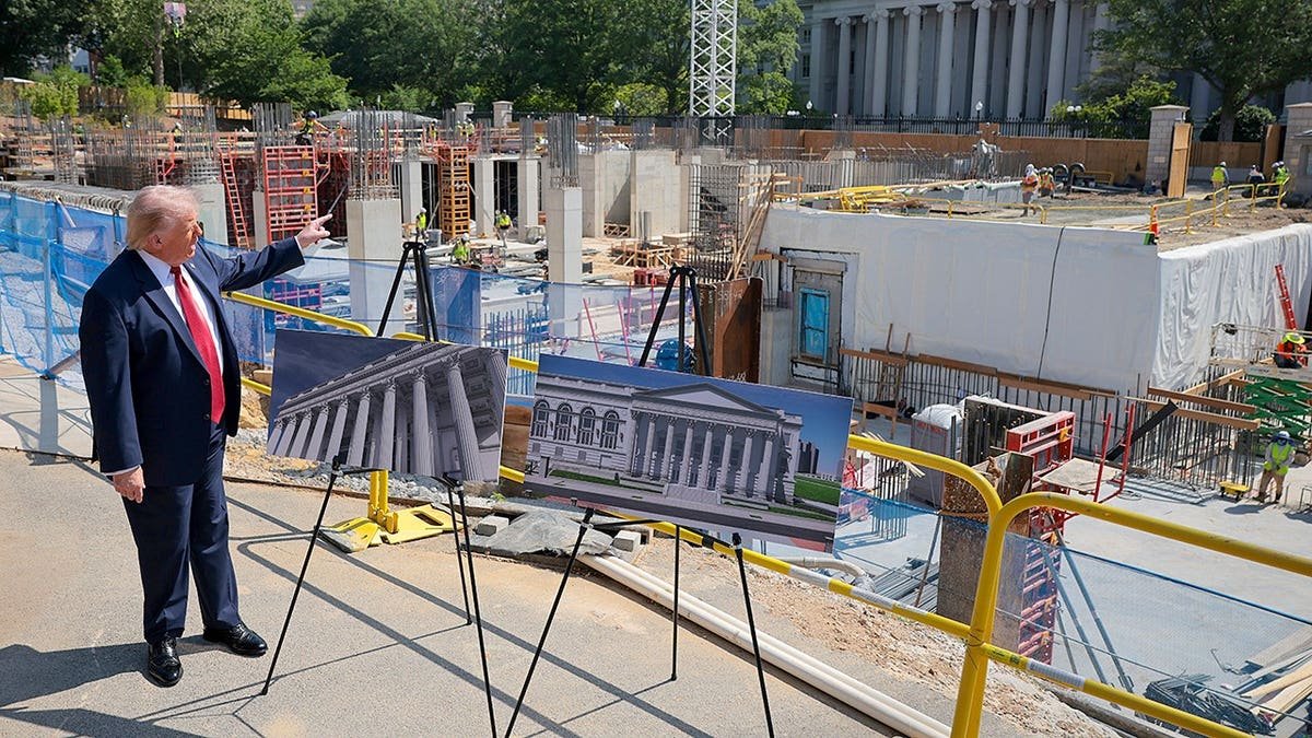 U.S. President Donald Trump speaks to the media alongside posters of his proposed White House ballroom amid construction at the White House on May 19, 2026 in Washington, DC.