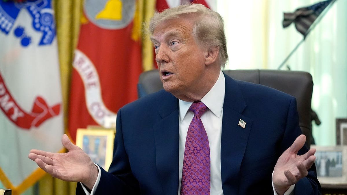 President Donald Trump speaks in the Oval Office.