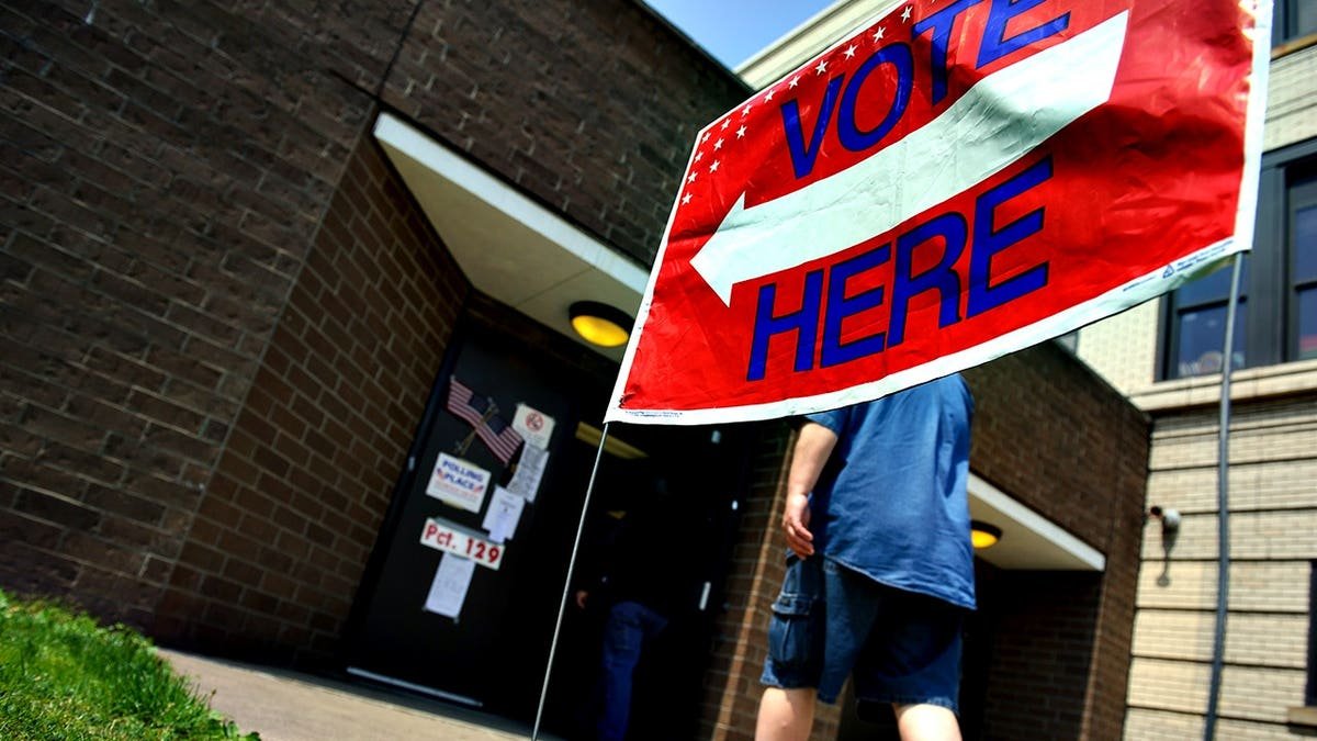 Voters entering the Tridelphia Middle School polling place in Wheeling, West Virginia
